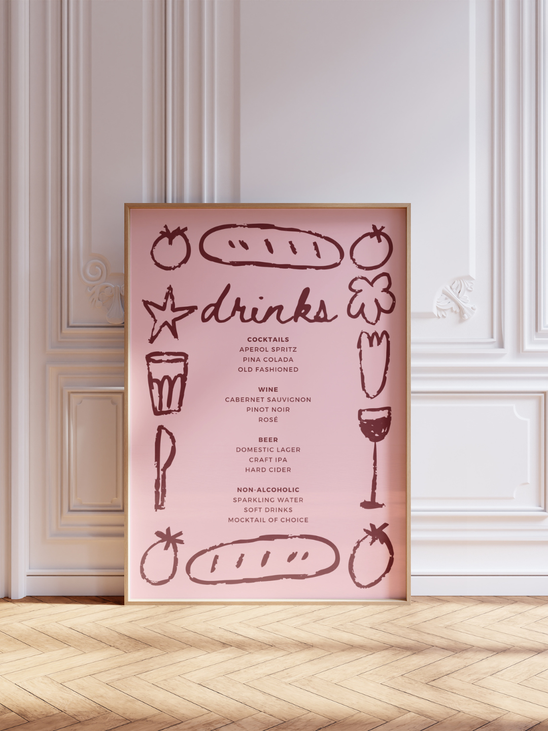 Pink menu board with hand-drawn food and drink illustrations, including pizza, tomatoes, a star, a butterfly, a carrot, wine glass, beer pint, and cocktail glass, titled 'drinks' with a list of cocktails, wine, beer, and non-alcoholic beverages.