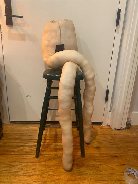 Libby Stew, "You Thought What You Saw Was It" 2024. Leg sculpture made out of pantyhose and pillow fill.
not for sale