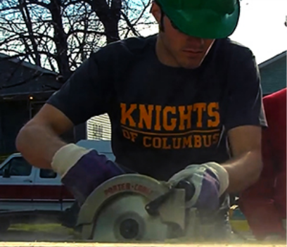 Knight sawing at service project