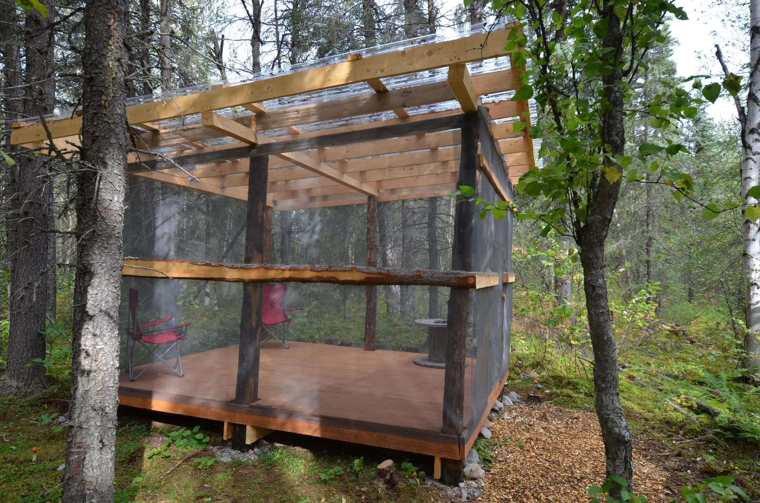 Port Alsworth campground hut. Huts are spacious enough to set up a 2 to 3 person tent inside or tent can be set up adjacent to hut.