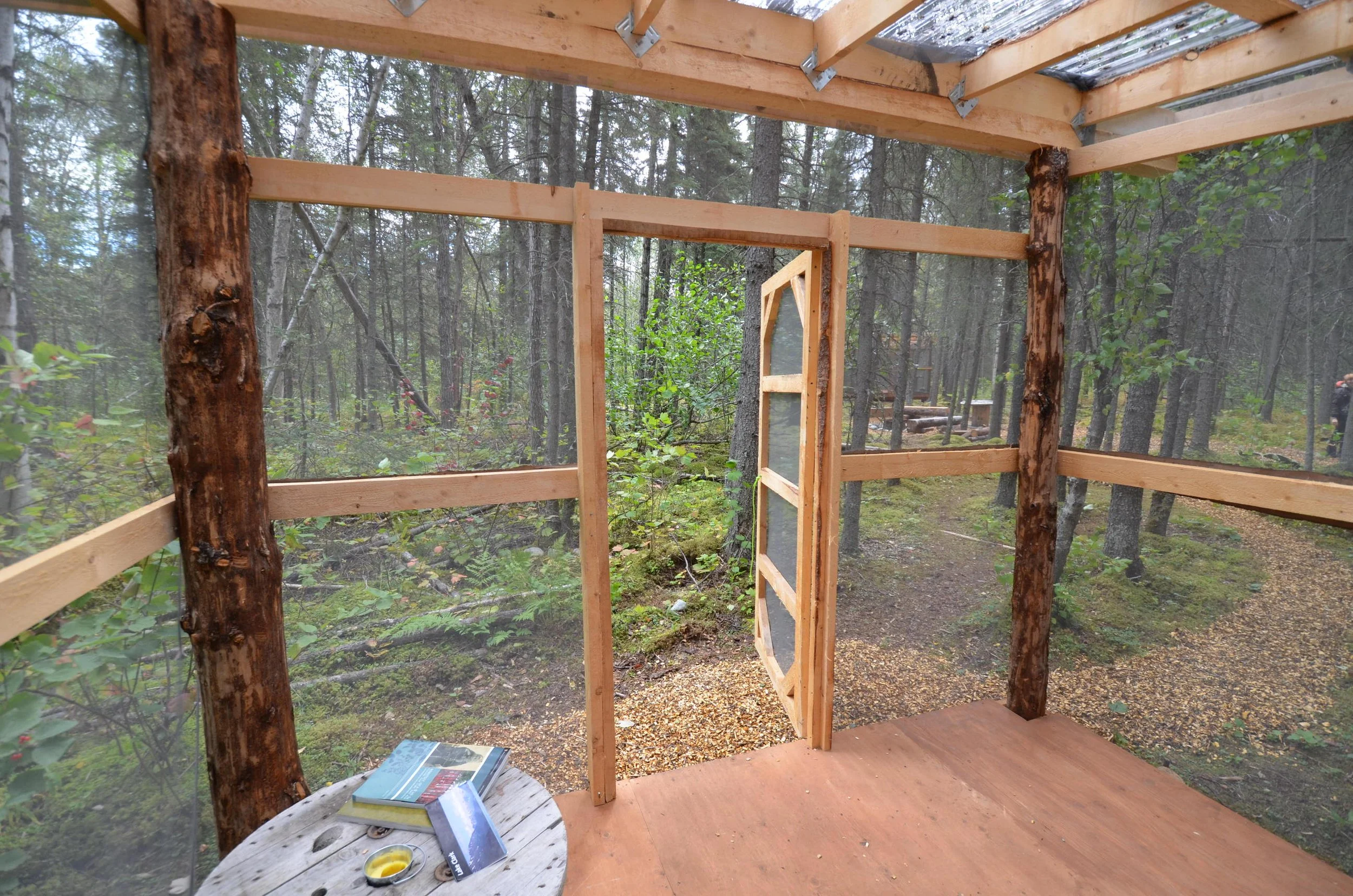 Port Alsworth campground huts are screened in for bug protection.