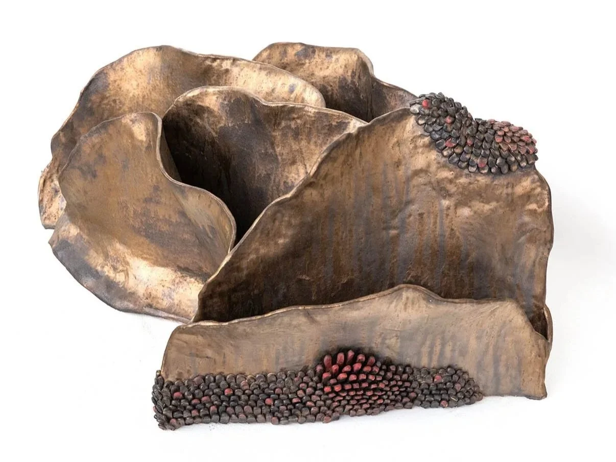 Seven Layers of Skin, 2025,
Ceramic, wooden acoustic sound box,
27 x 37 x 39in