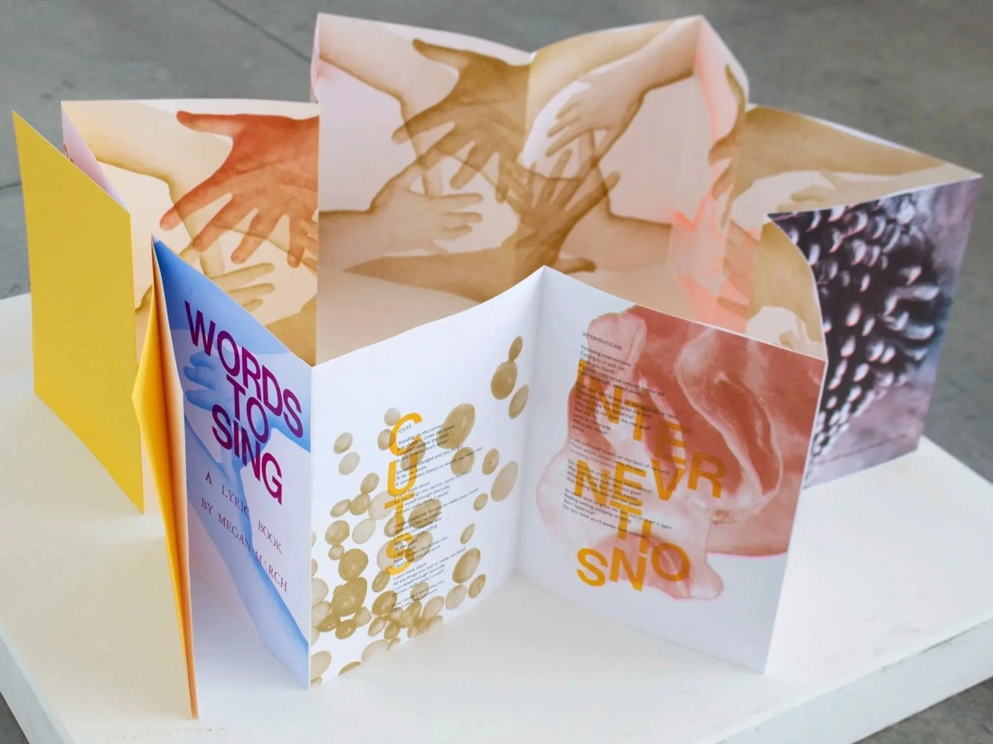 Words To Sing (with hands), 2025,
Risograph and letterpress printed lyric accordion book