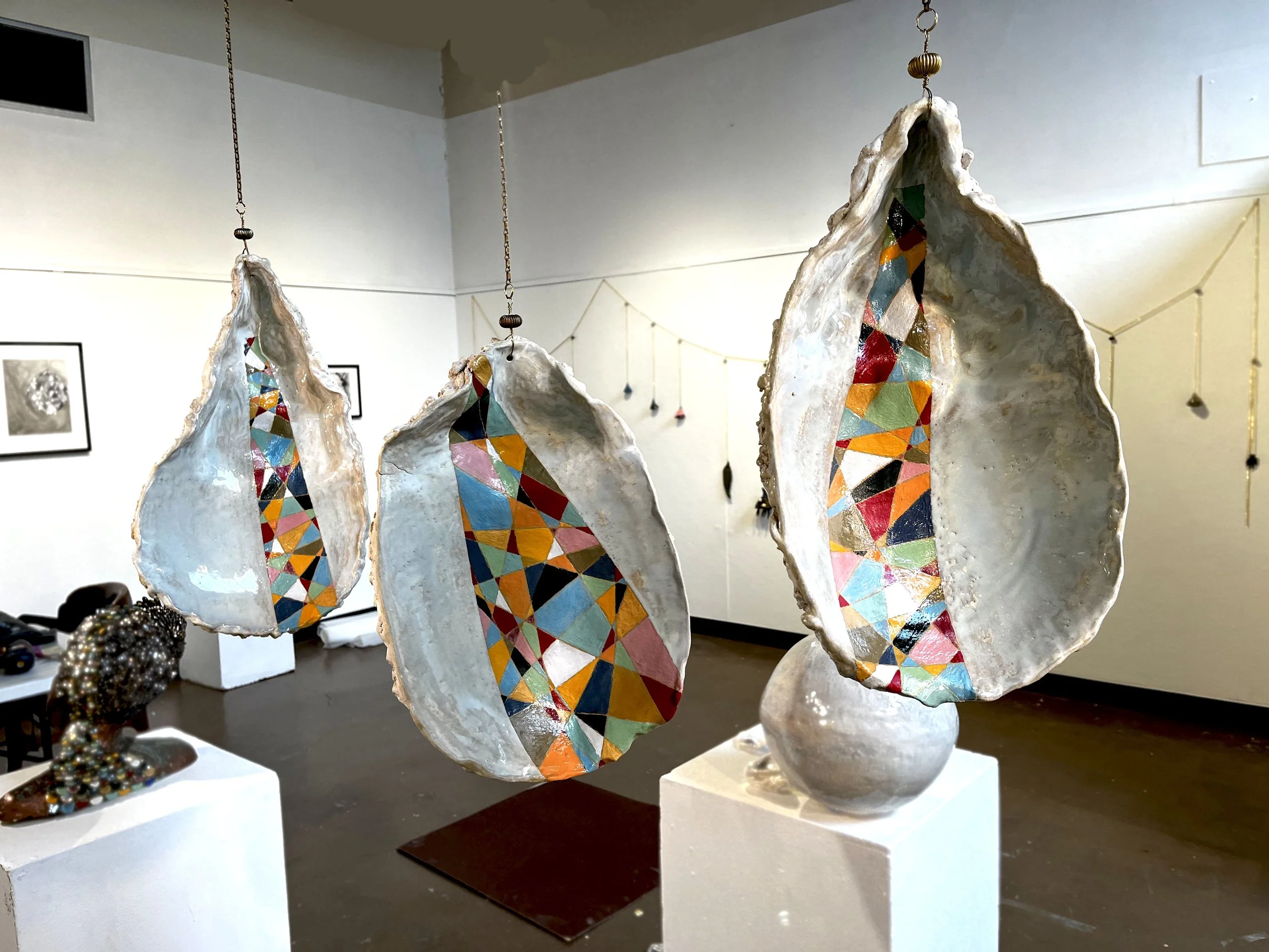 THE THREE SISTERS, 2024,
Ceramic, Brass chain
