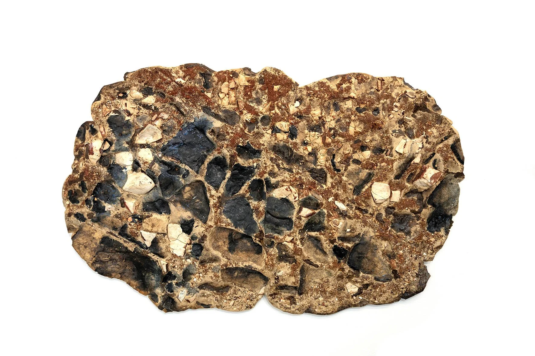 Skin Impressions: Captured Rock With Fossils
Stoneware (50lbs), captured rock from an ancient seabed exposed by a roadcut
25 x 40 x 1in
