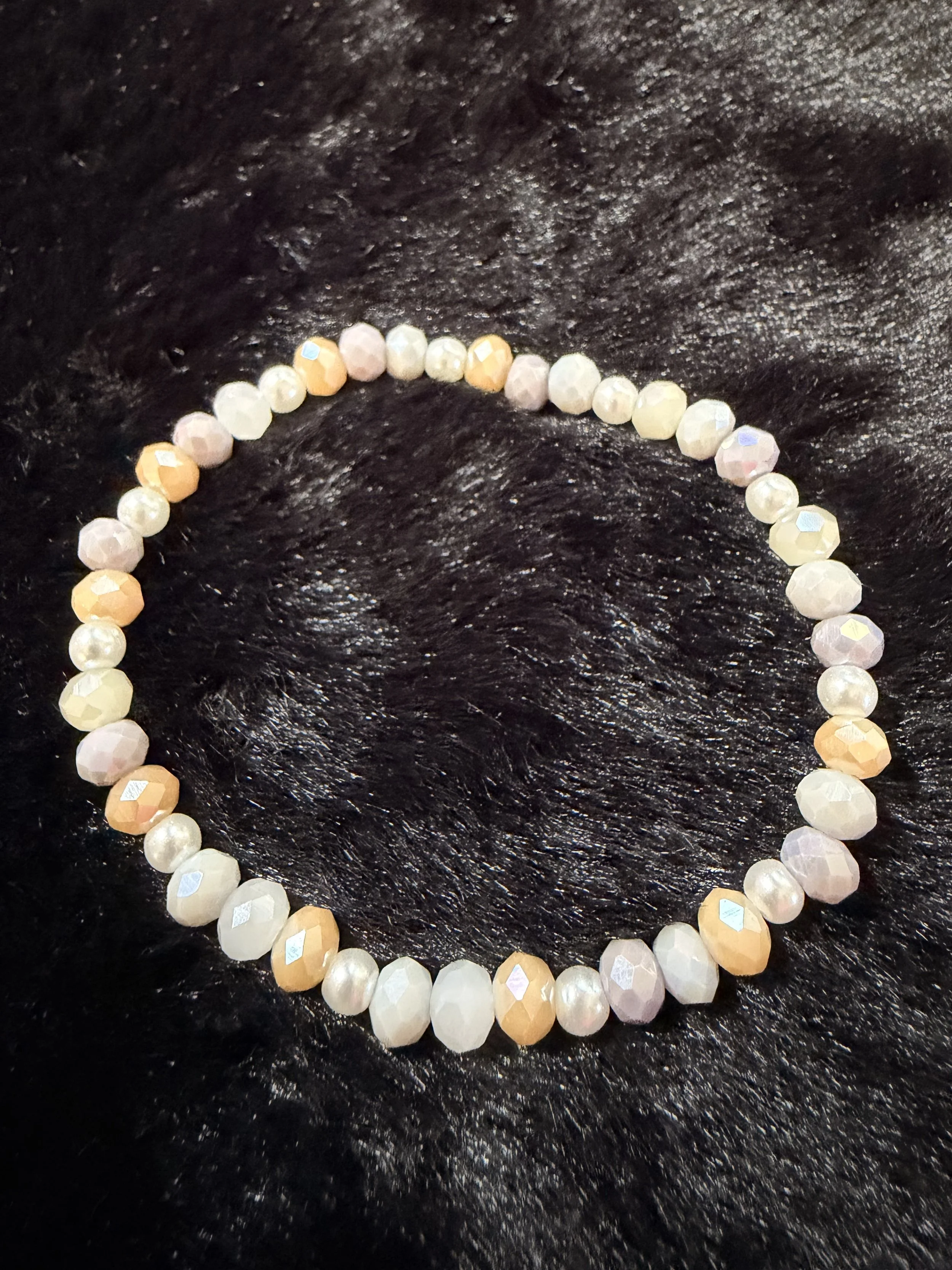 Pearl, tan, white gray crystals
