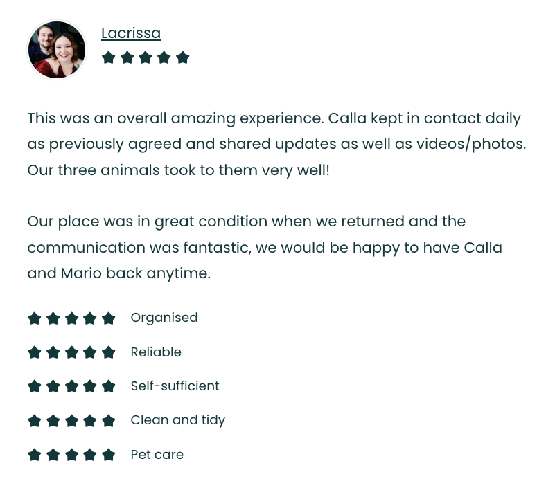 Photo of a happy woman with red lipstick and a man, both smiling, with a dark background.