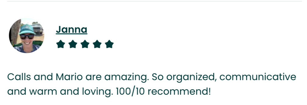 Profile picture of a woman wearing sunglasses and a blue cap, smiling.