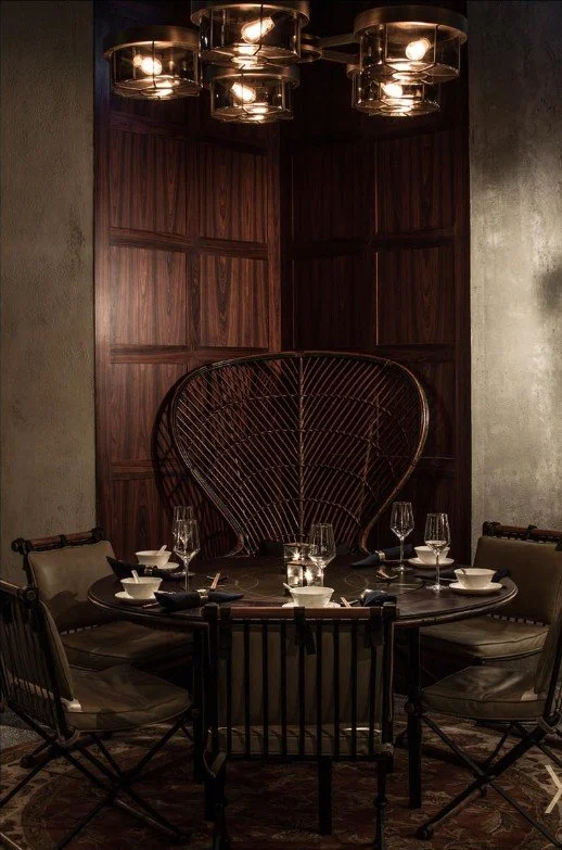 Mott 32, an award-winning Chinese Restaurant, interior dining area by Wang Fang Construction, featuring rustic dining table, in Hong Kong Central