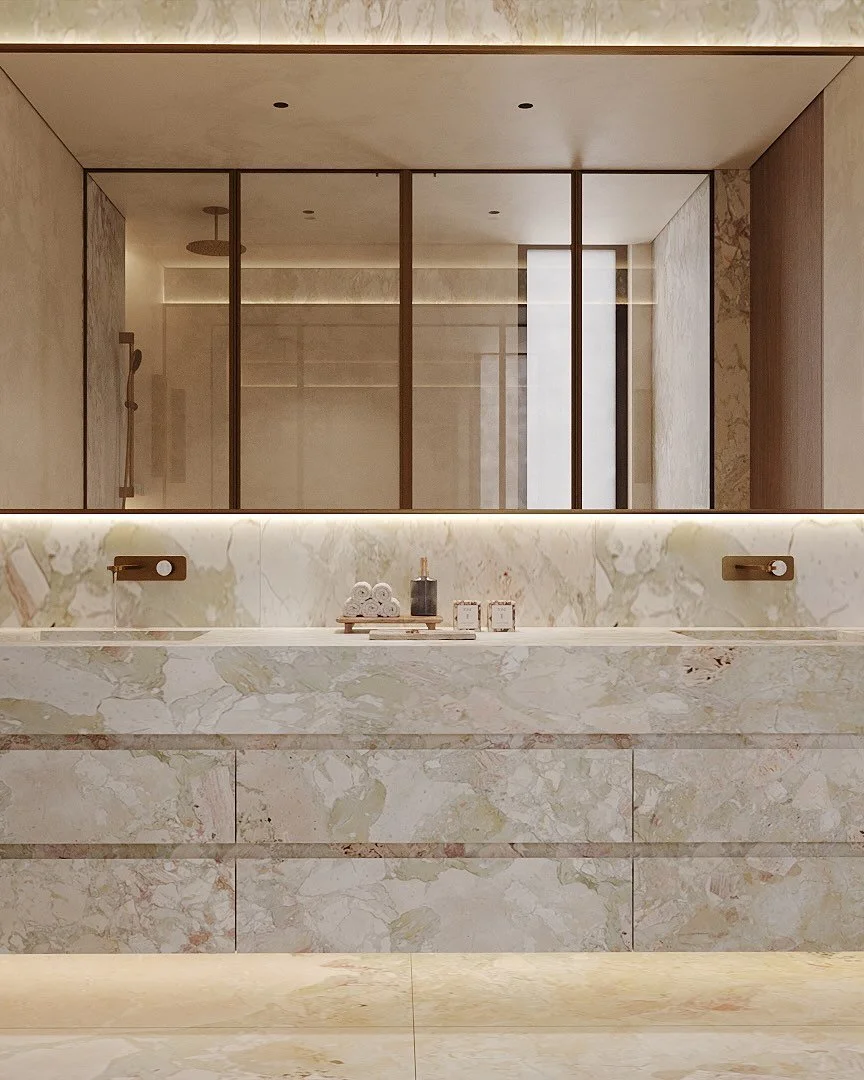 Continuing through the master suite of The Villa, we take a closer look at the material palette in the bath. We pushed for a bold, monolithic look; enveloping the vanity and floors in statement marble.

The bronze-framed glass partitions add structur