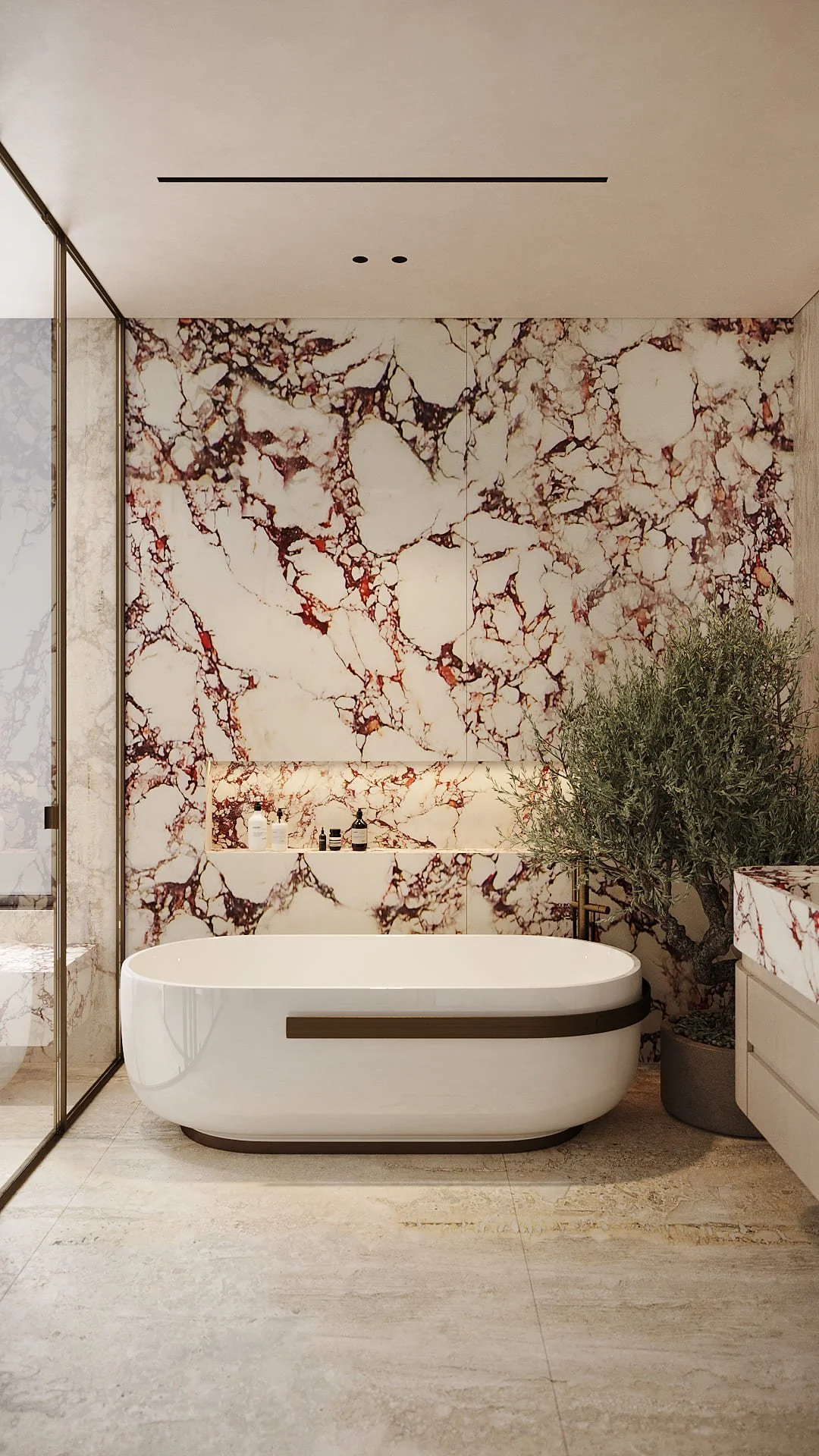 Master bathroom in Villa De Bomma, Jumeirah Islands, with a full-height Calacatta Viola marble feature wall, freestanding oval bathtub, brass fixtures, and a potted olive tree by Limestone