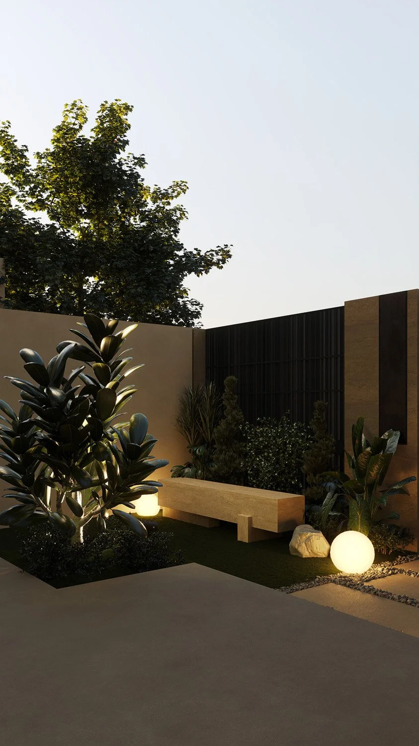 Japanese-inspired garden corner in a Dubai Hills villa landscape, featuring a sculptural travertine bench, layered greenery, and a slatted privacy screen, designed by Limestone
