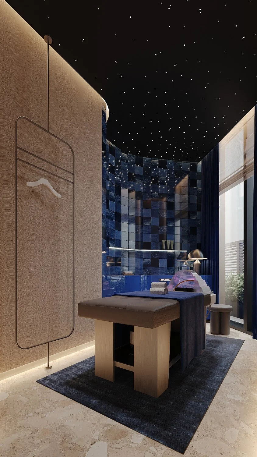 Facial treatment room by Limestone at FŌM Hygge Spa, City Walk Dubai, with a curved blue Zellige wall, starry ceiling, blue velvet drapes and textured walls