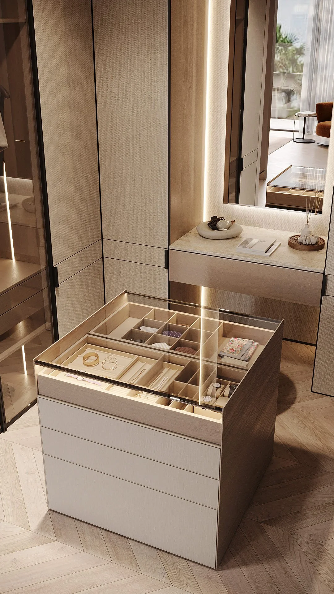 Jewellery island detail in the master walk-in wardrobe of Villa De Bomma, Jumeirah Islands, with a glass-top display tray, organised compartments, and backlit cabinetry by Limestone