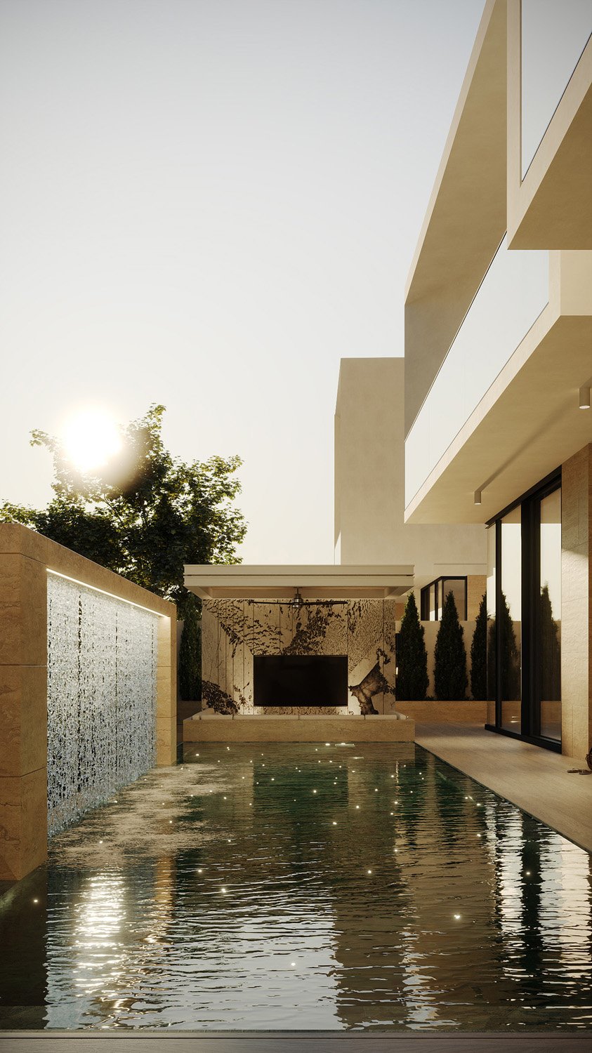 Sunken outdoor cinema seating in a Dubai Hills villa landscape, with a stone feature wall, mounted TV, cantilevered pergola, and adjacent cascading water feature, designed by Limestone