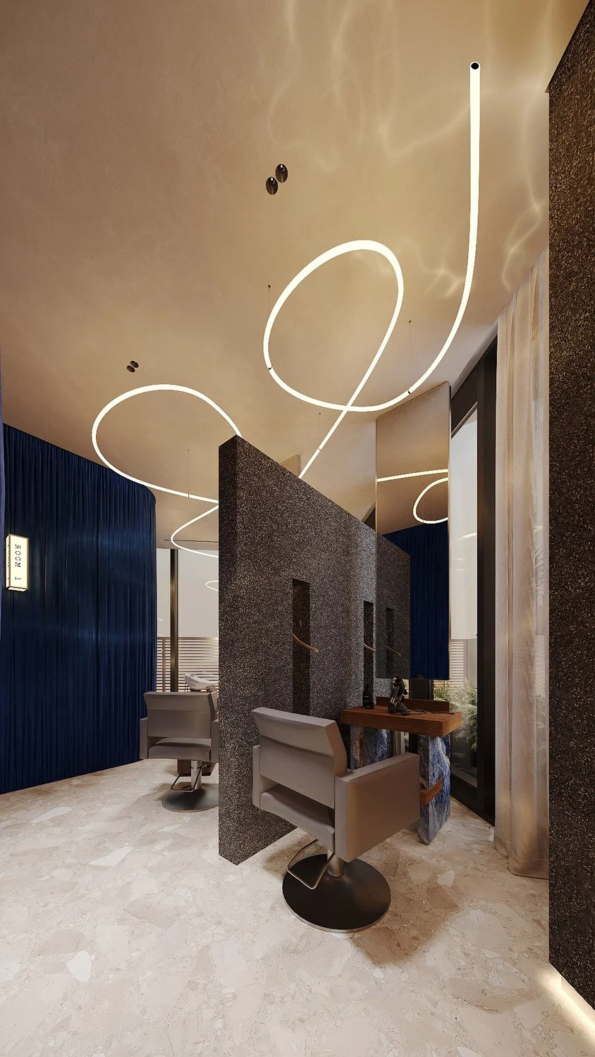 Salon interior design by Limestone at FŌM Hygge Spa, City Walk Dubai, with styling stations set into a resin crushed stone partition beneath sculptural linear lighting