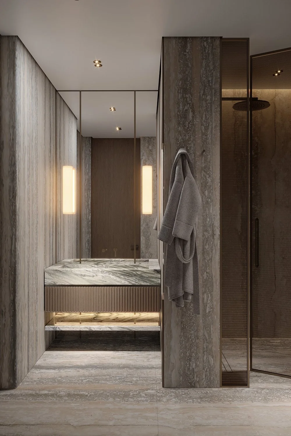 Bathroom vanity in Villa Viola, Dubai Hills, featuring travertine-clad walls, a green-veined marble countertop, ribbed wood cabinetry, and a glass-enclosed walk-in shower by Limestone