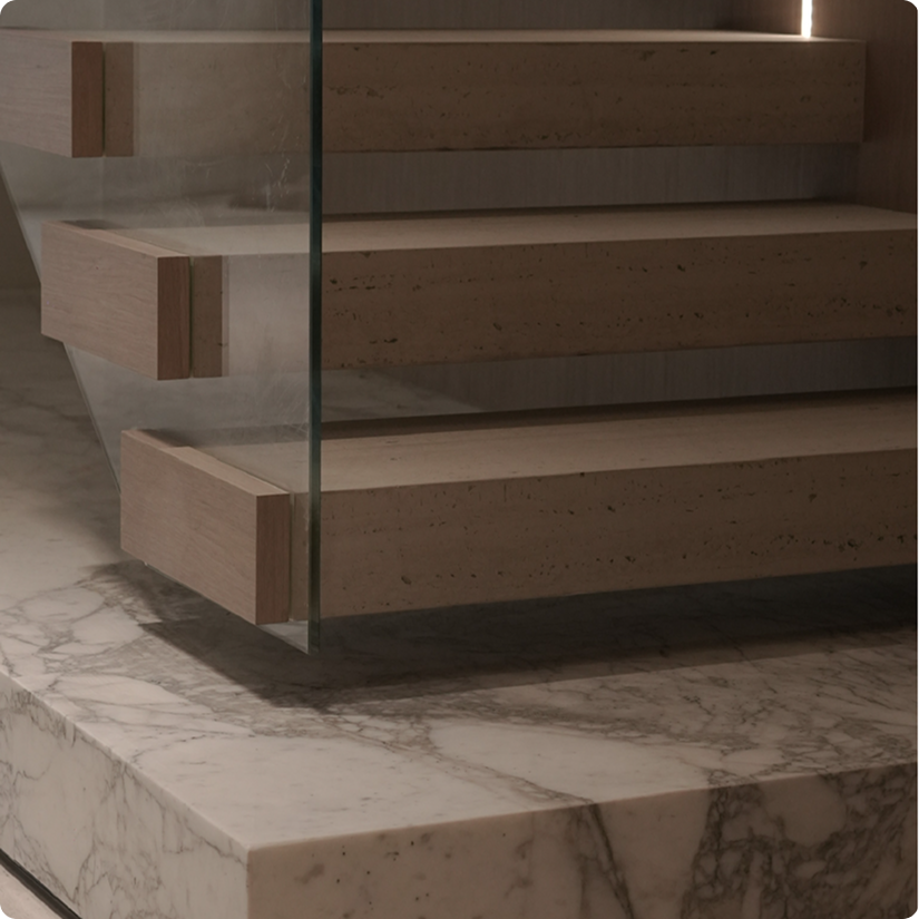 Limestone signature detail — floating staircase with glass handrail fixed to steps with metal bolts concealed beneath step-matching cover pieces, luxury interior design Dubai