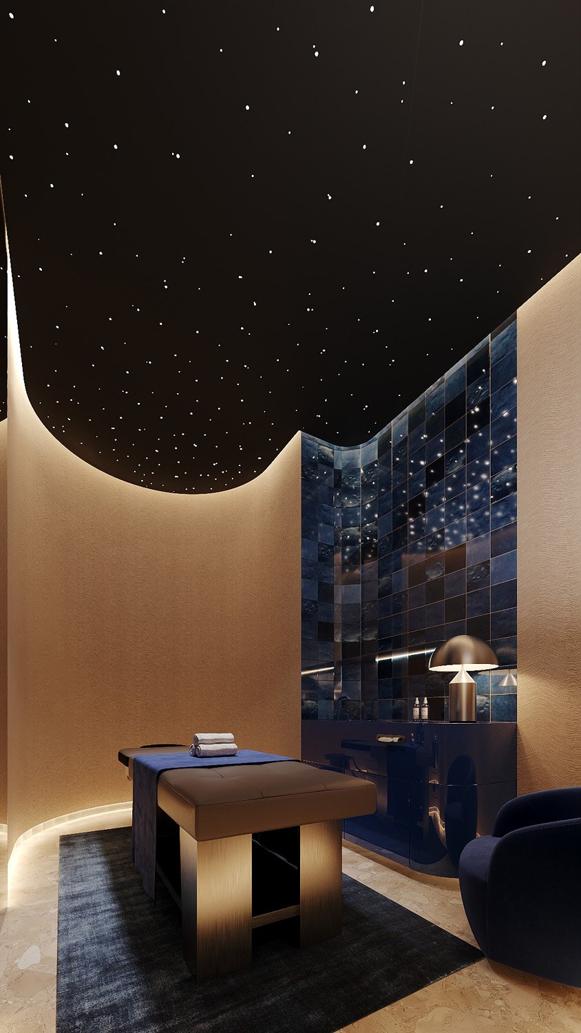 Luxury spa treatment room at FŌM Hygge Spa, City Walk Dubai, by Limestone, with a fibre-optic starry ceiling, curved blue Zellige wall and velvet lounge chair