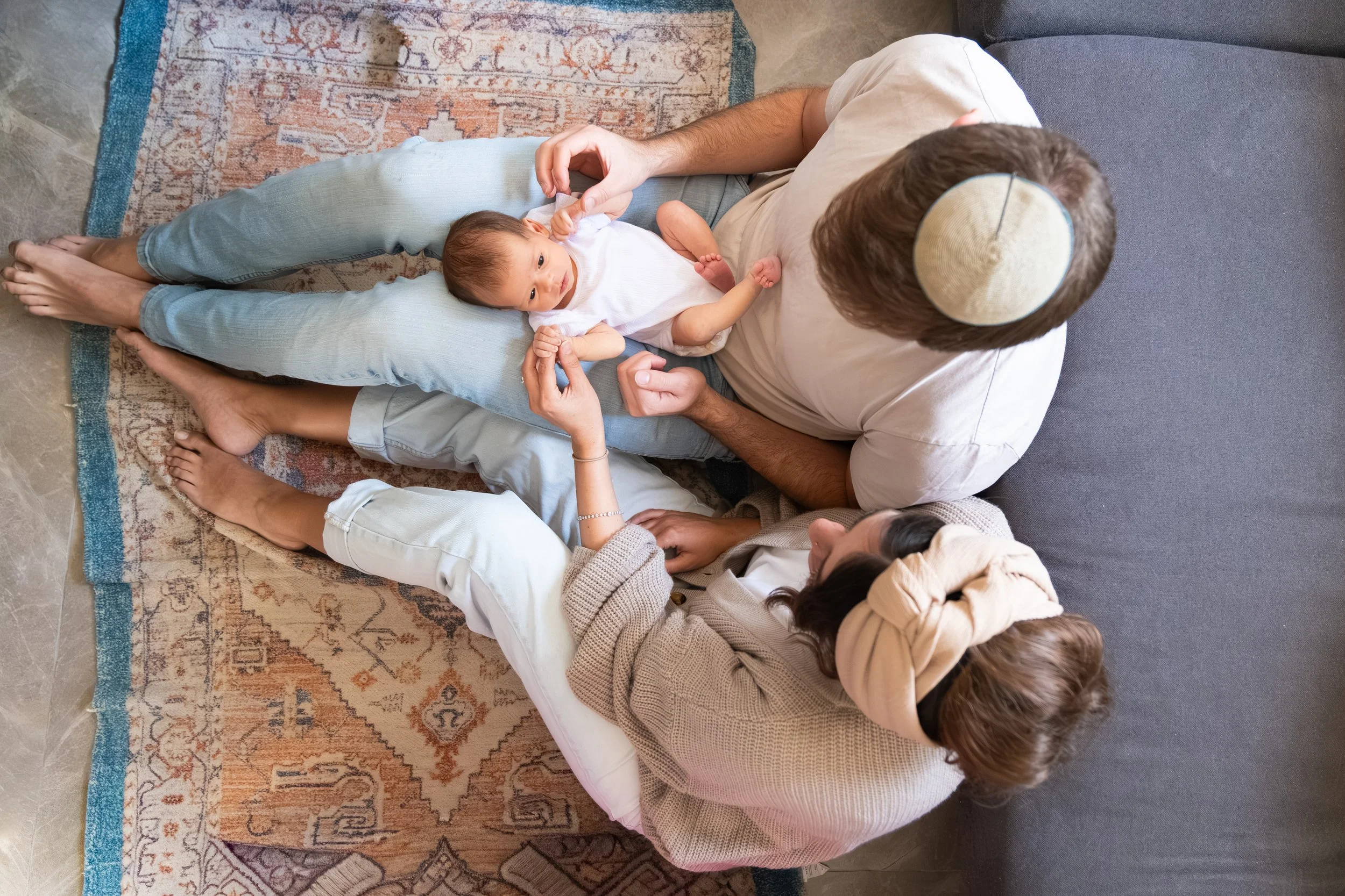 Family with baby at home
