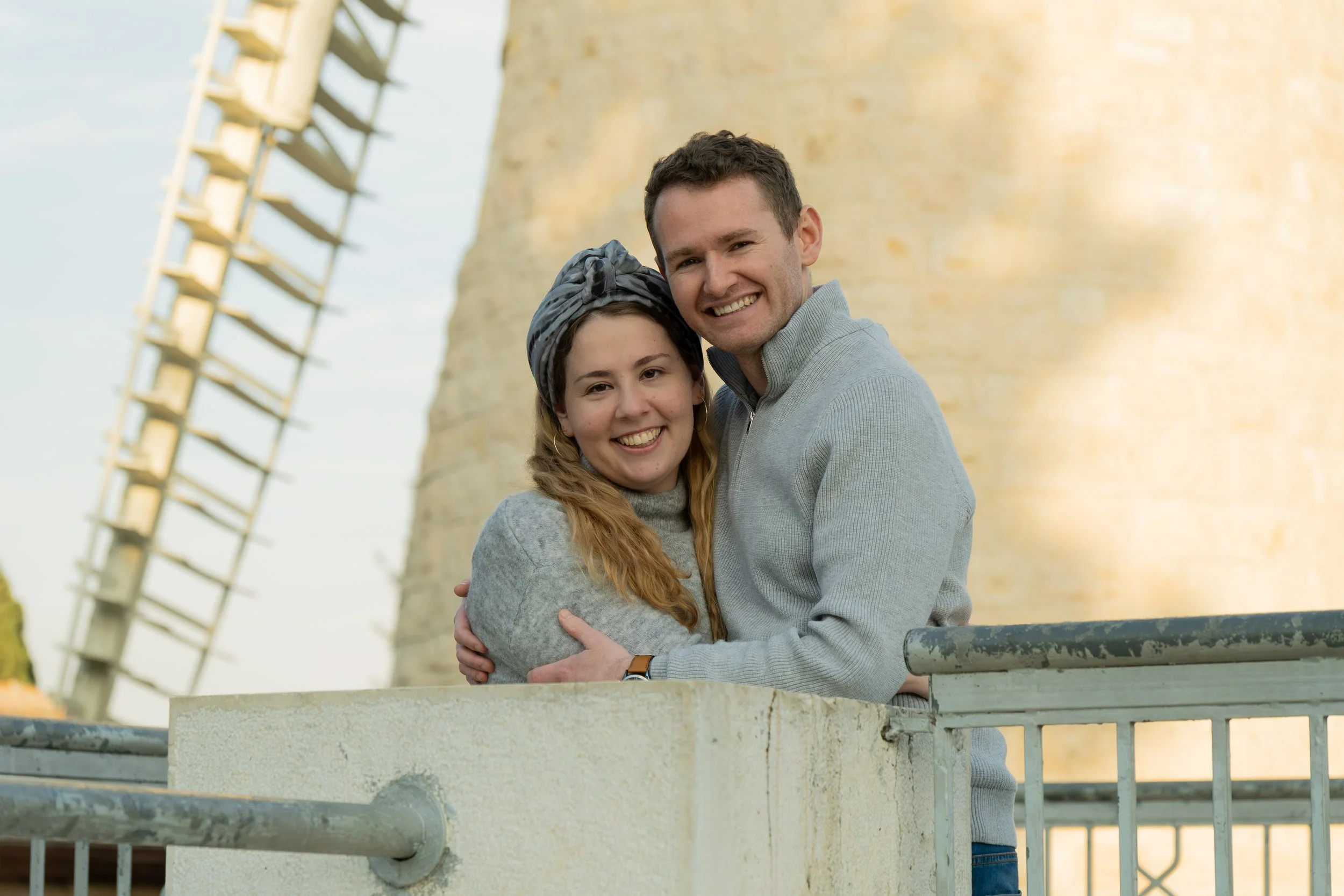 Couple at a windmill. Photoshoot.