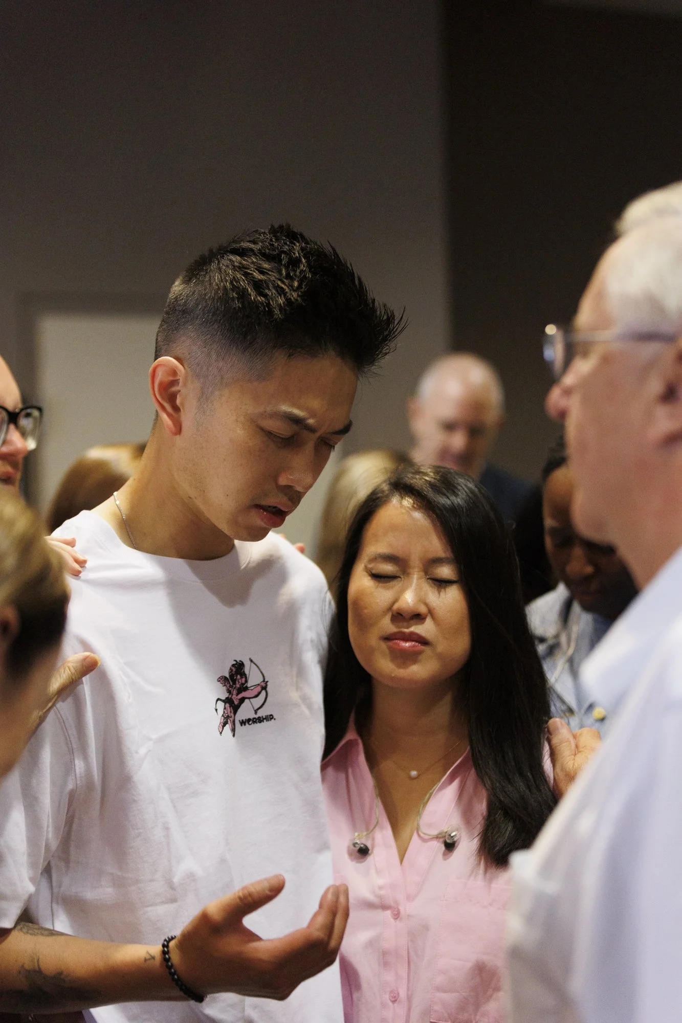 Pastors Adrian and Jess Tam praying at Worship service at Citizens Church Sydney