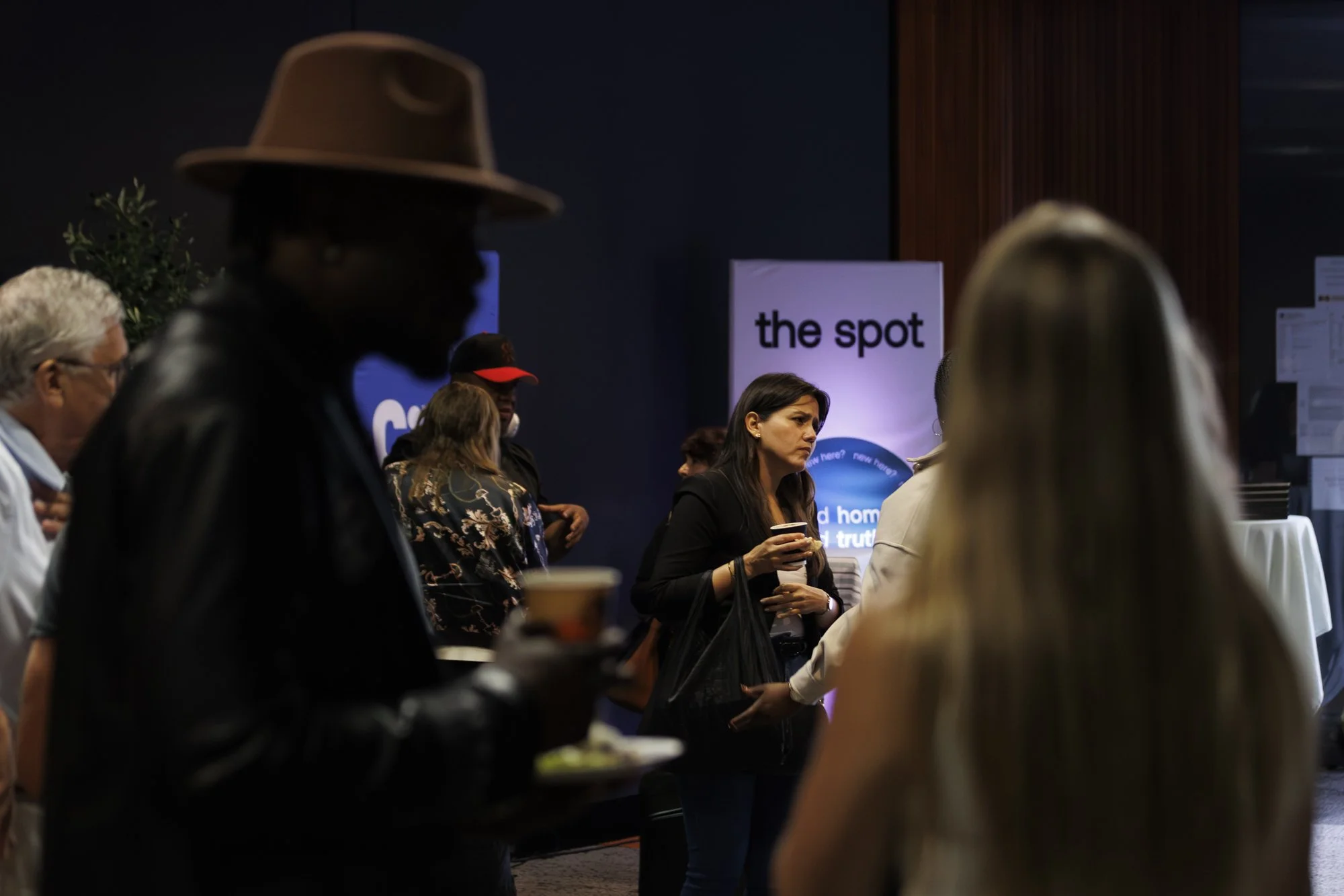 Group of people standing and talking at Citizens Church Sydney