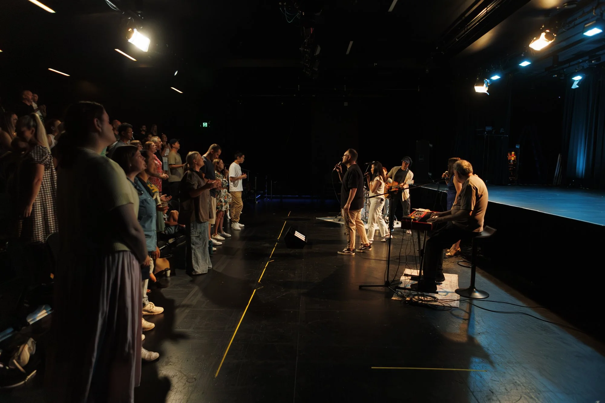 Audience and band on stage at Pastor Adrian Tam preaching at Citizens Church Sydney