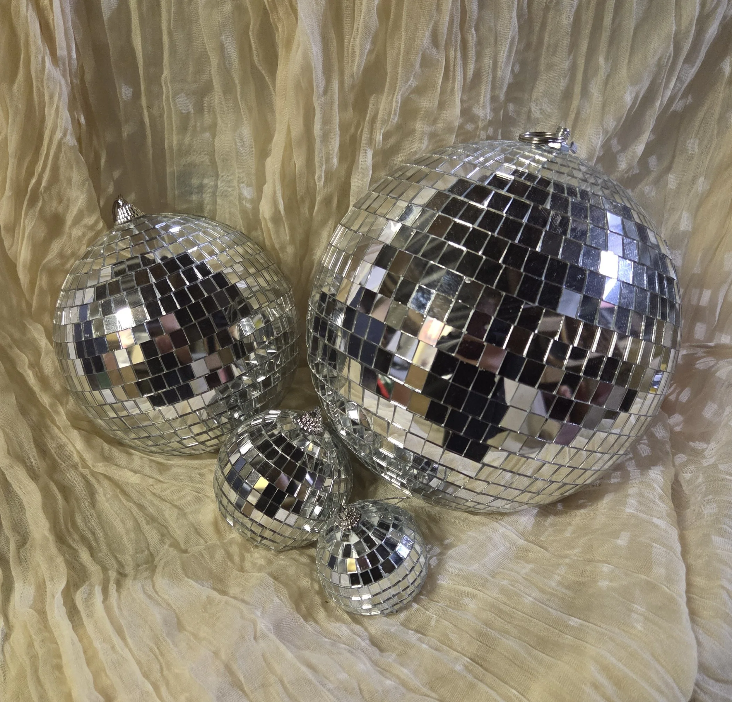 Various sized disco balls for décor | £15.00 for all 40