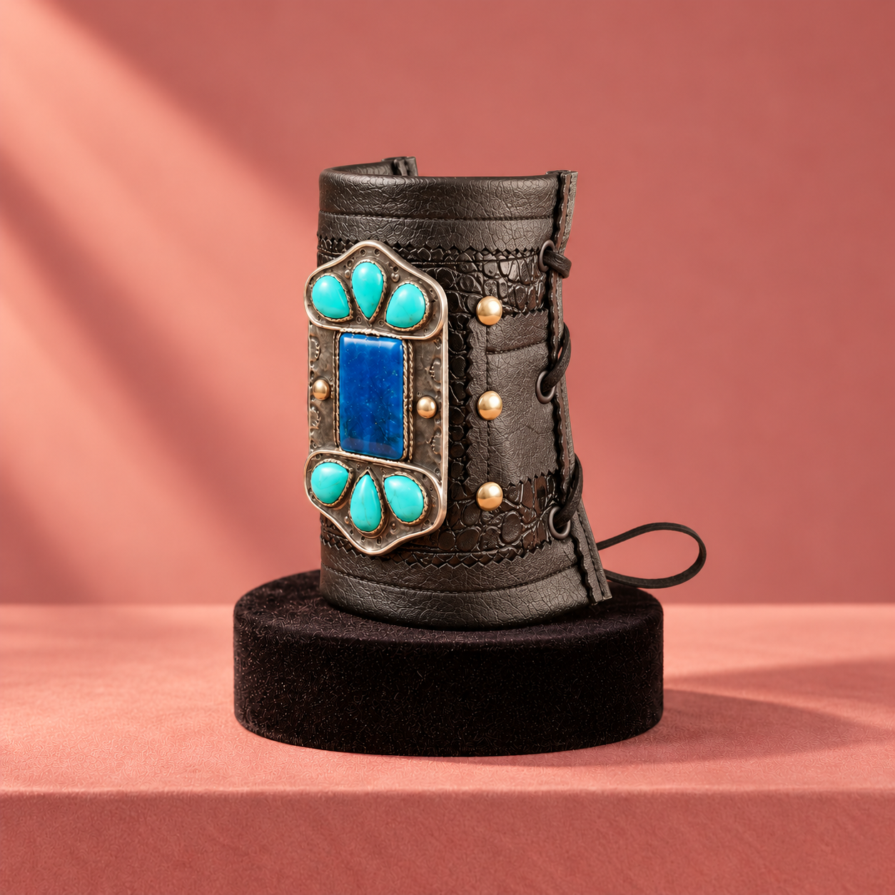Retro jeweled leather cuff on velvet.png
