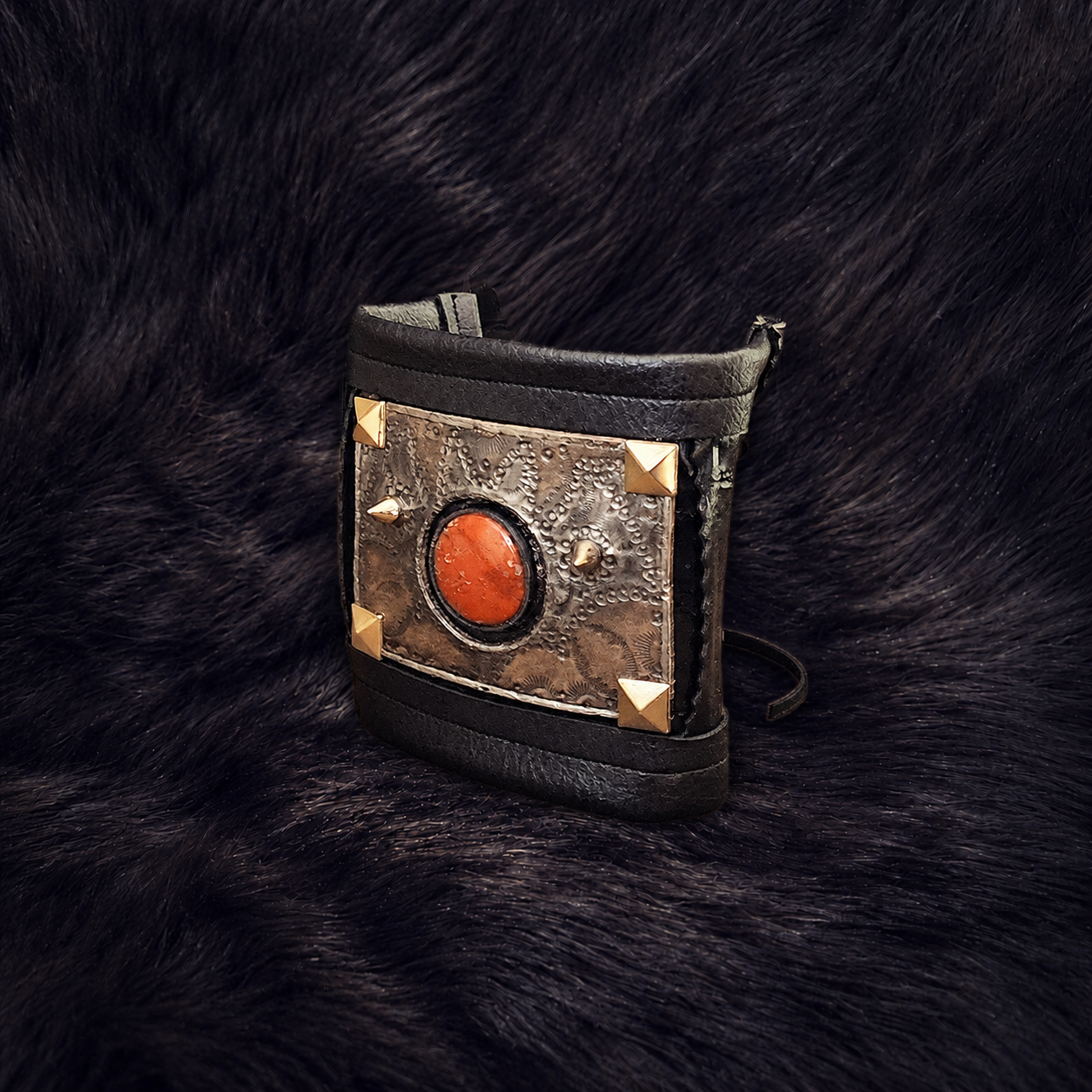 Artisan leather cuff on dark fur-2.png
