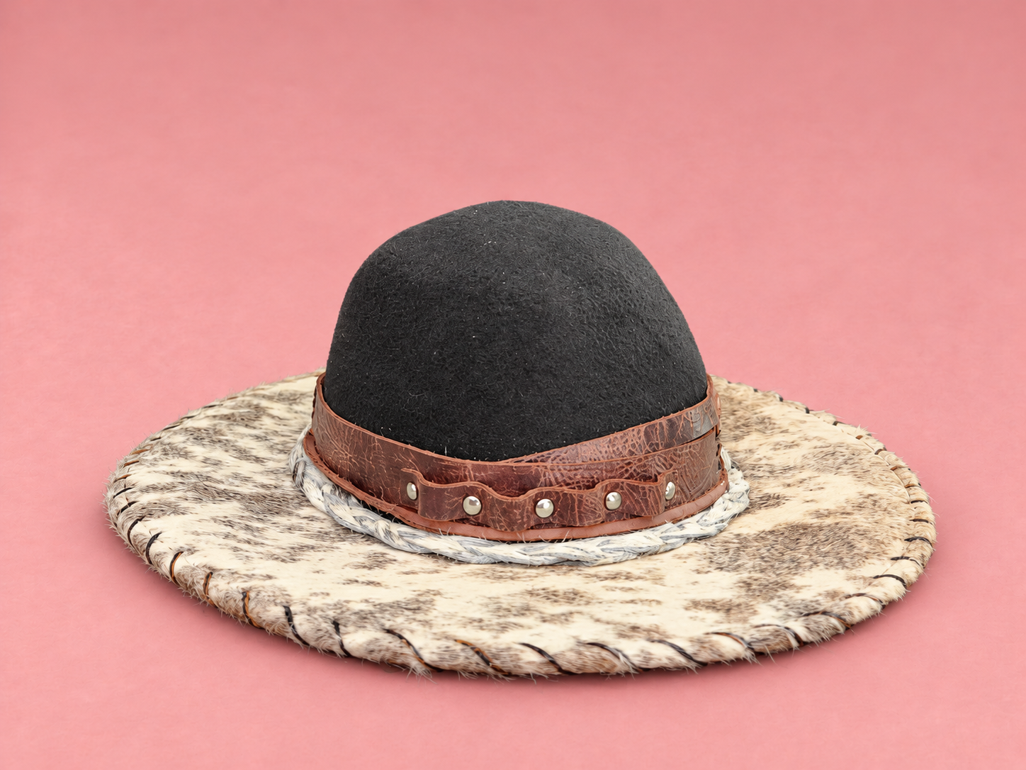 Black Western Hat on Blush Pink Background.png