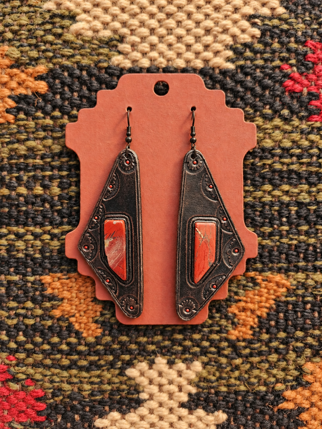 Artisan Leather Earrings on Kilim Display Card.png