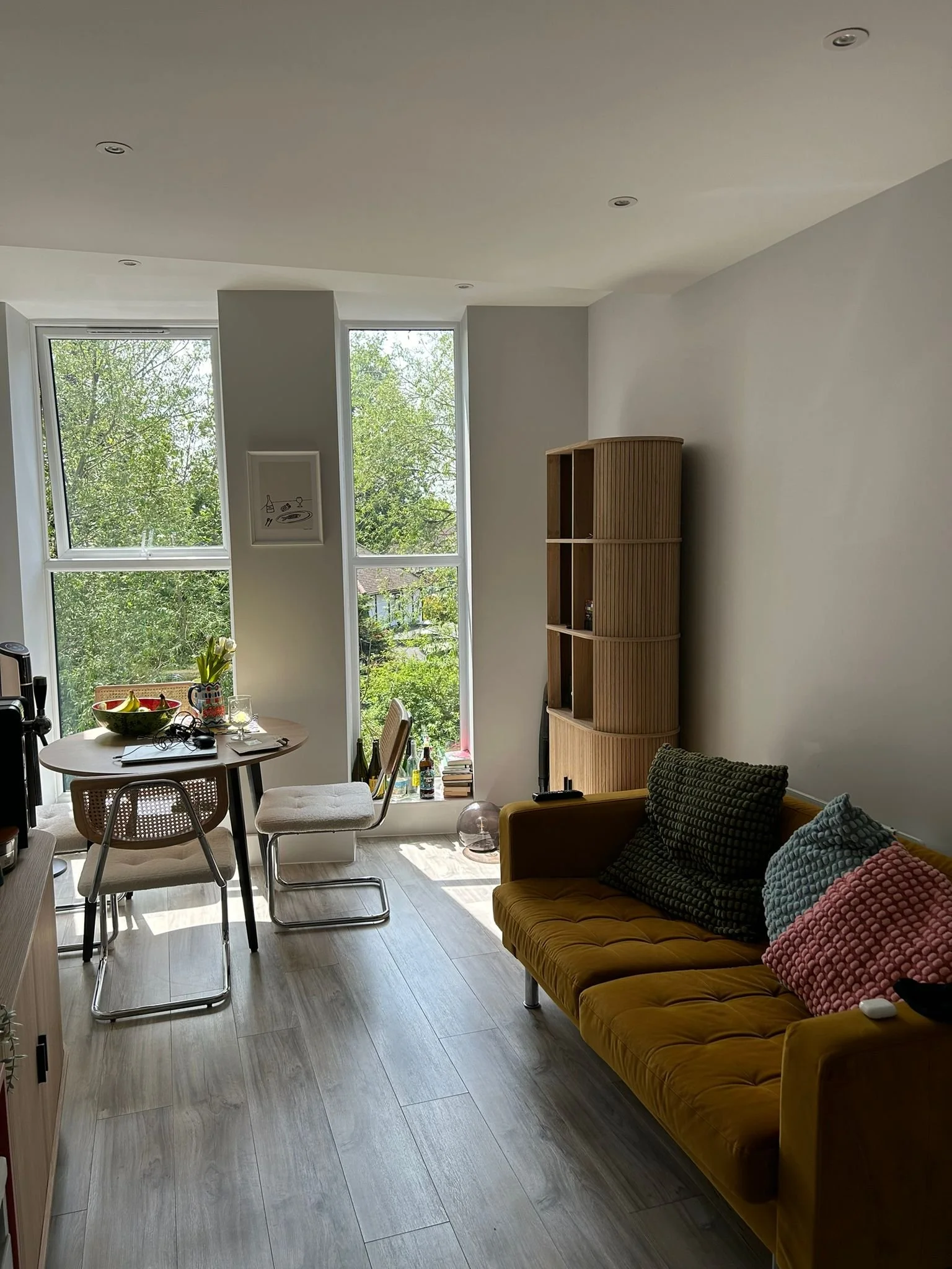 Light-filled open-plan area finished in soft neutrals for a refined, contemporary look.