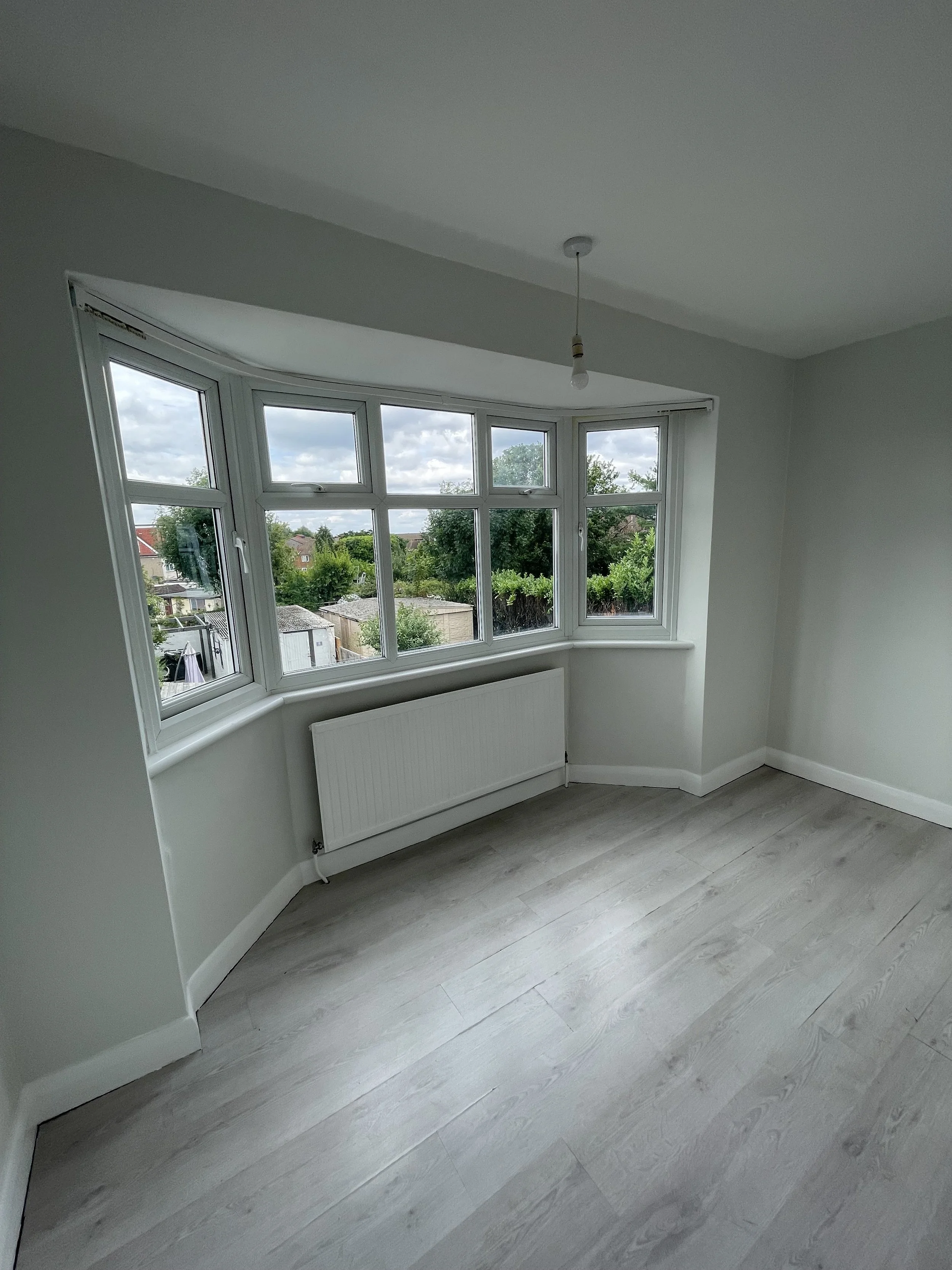 Smooth walls and clean lines highlighting attention to finish and surface preparation.