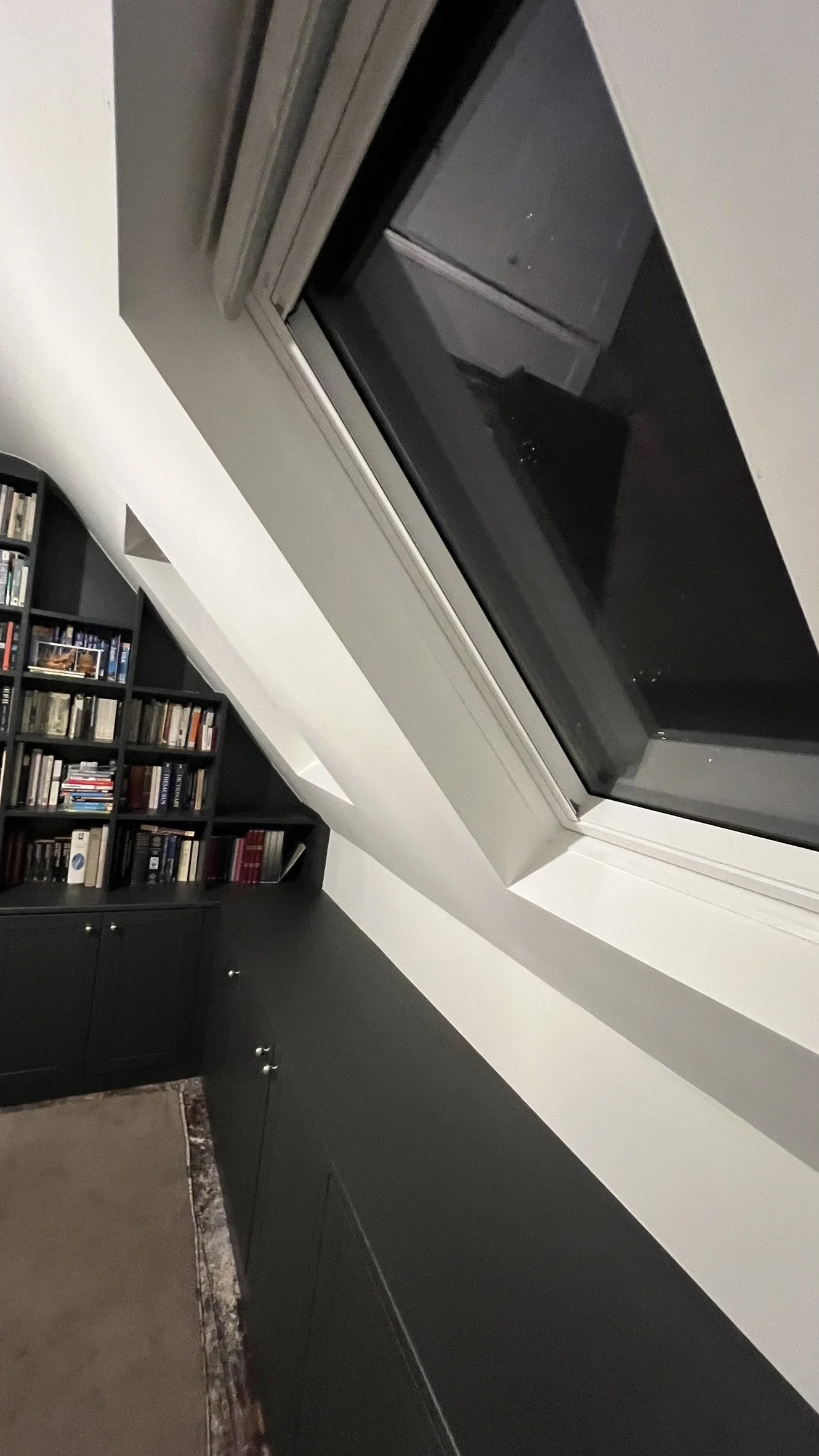 Loft study redecoration with carefully prepared walls, crisp woodwork detailing, and a durable, refined finish suited to a contemporary workspace.