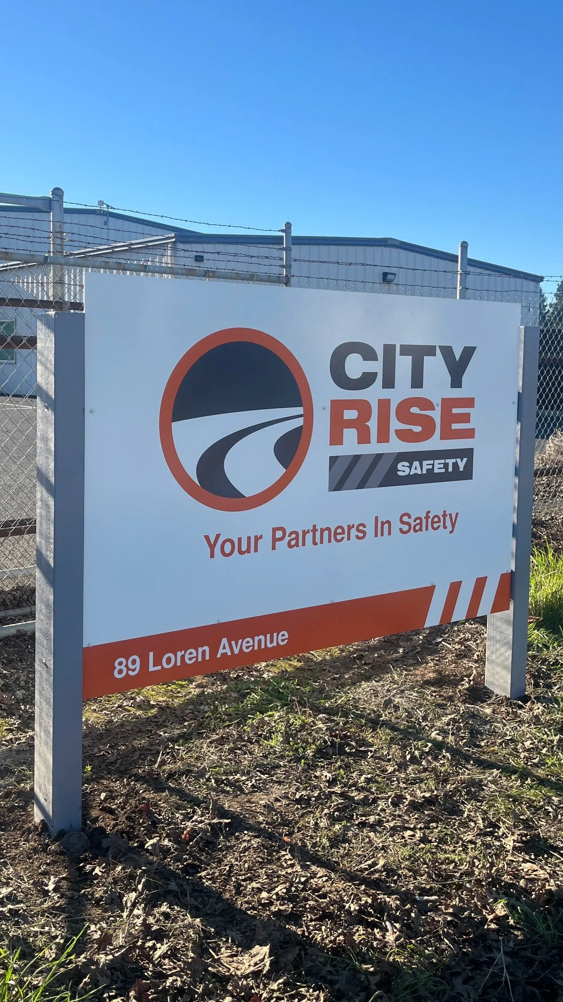Post & panel ground sign for City Rise Safety built and installed by North State Signs in Chico, California.