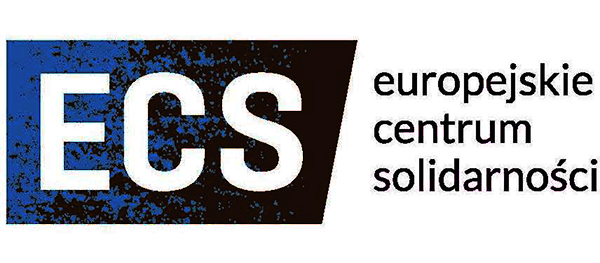 Close-up of a sign with large, colorful letters spelling 'ECS' and some smaller text underneath.