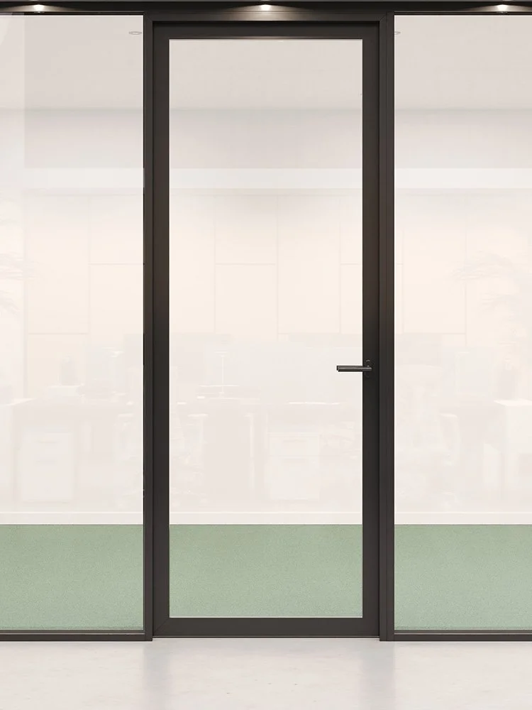 Glass door with black frame leading to an office space, with partial view of green carpet inside.
