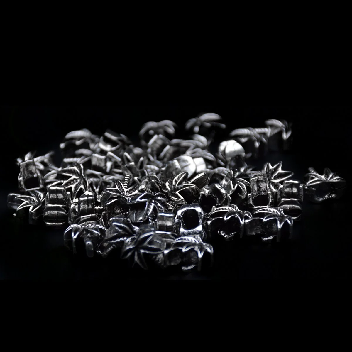 tropical coconut tree shape Tibetan silver antique big hole pandora beads for jewelry bracelet making scattering around in black background