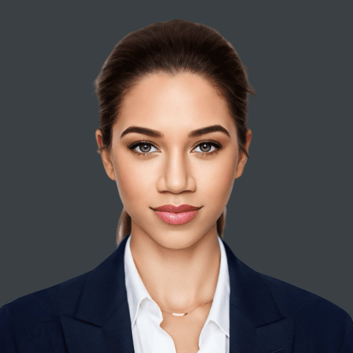 Professional woman with brown hair in a bun, wearing a navy blazer and white shirt, against a dark gray background.