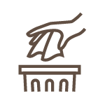 A hand placing a piece into a game of chess