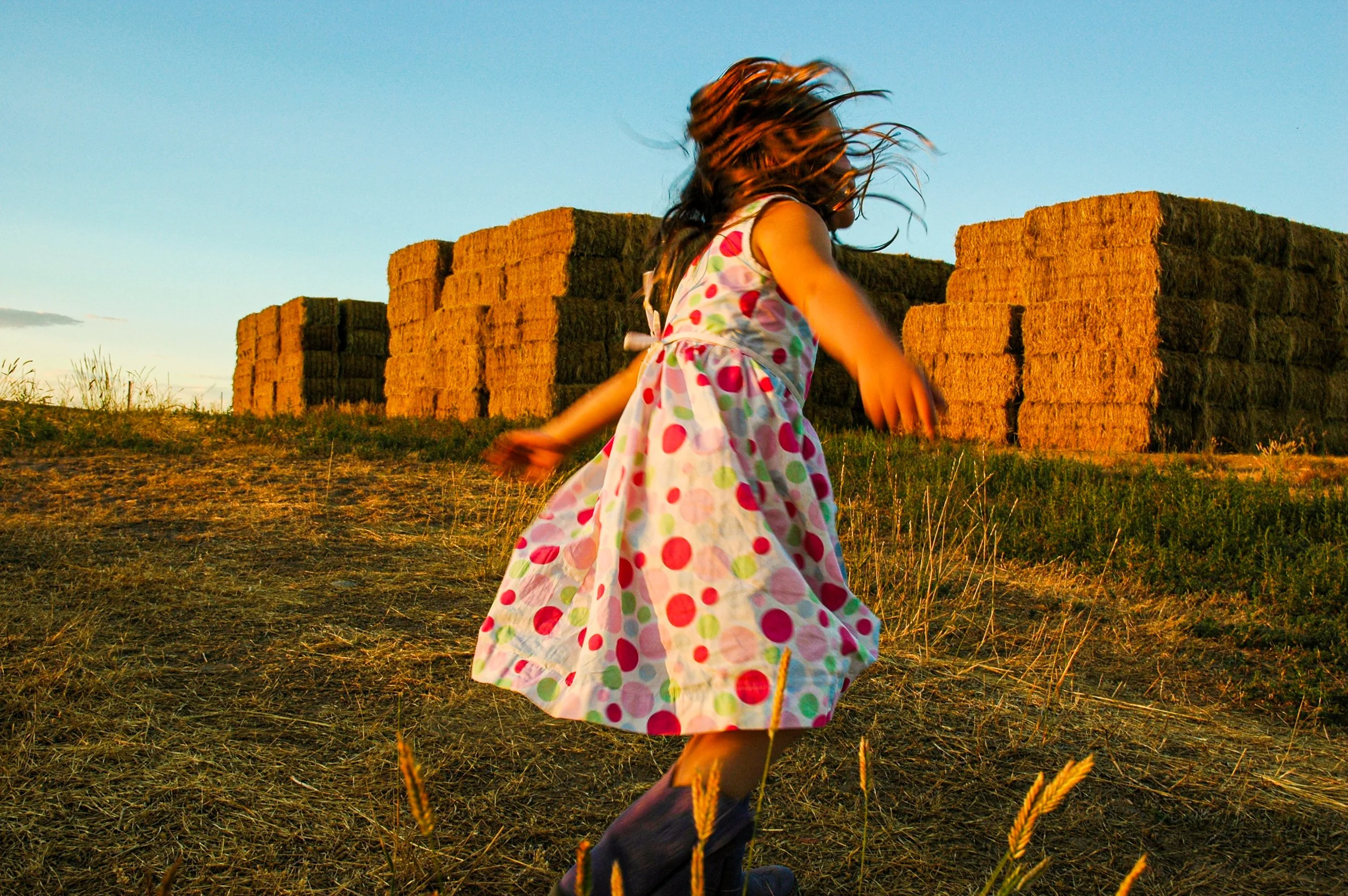Twirling in Hay Field-2.jpg