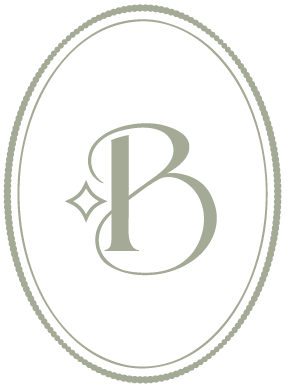 A black oval logo with a large stylized letter 'B' surrounded by a thin white outline and a small star-like sparkle on the left side.