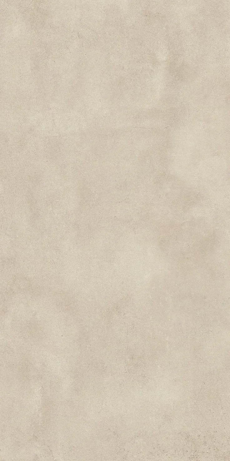 A plain, textured, light beige background with no objects or features.