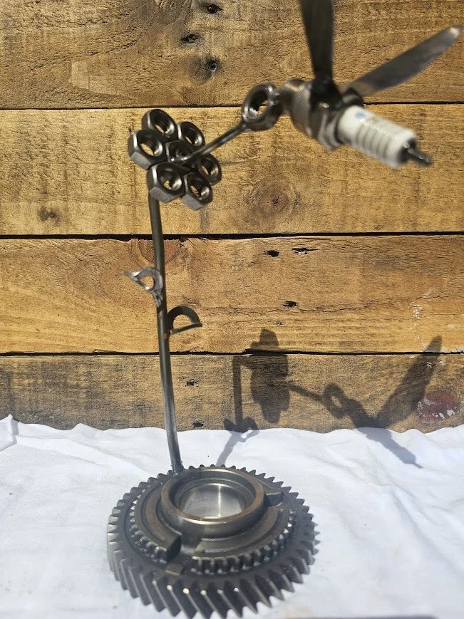 humming bird on flower metal art piece