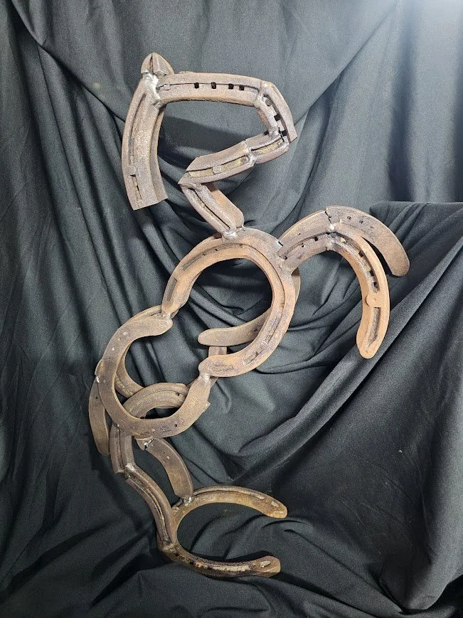 Horseshoe horse sculpture