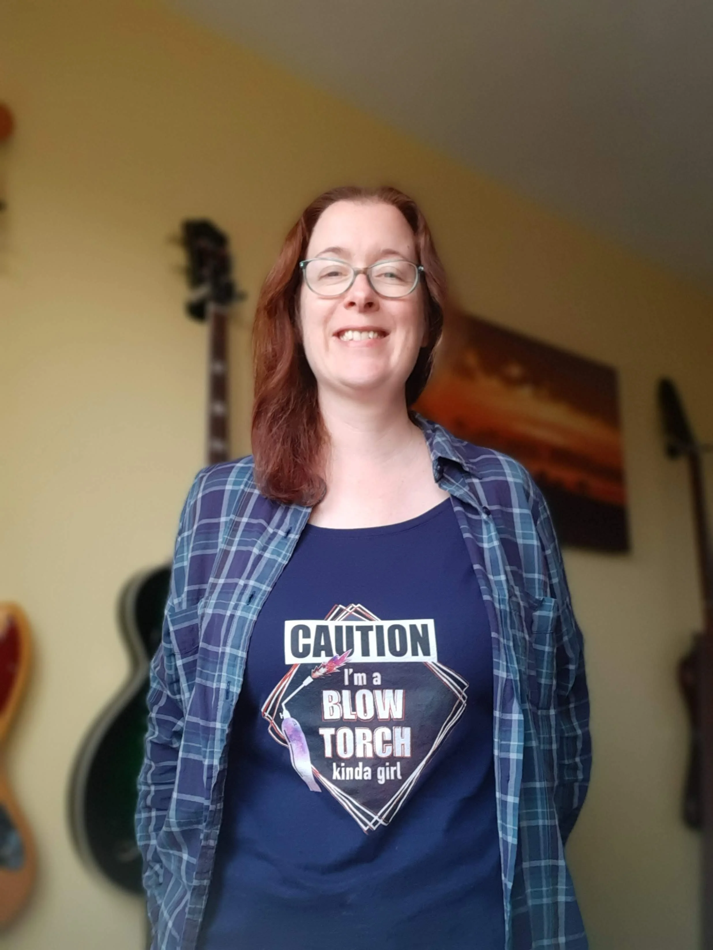 Sarah @ Glitter Viking wearing a 'Caution I'm a blow torch kinda girl' t-shirt