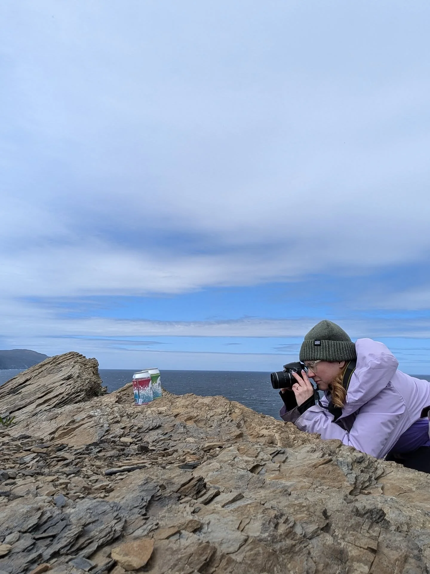 Behind every majestic photo of our seltzers in Gros Morne is one of us awkwardly crouching, while tourists question our sanity. The glamour of running a small business is truly unmatched. 📸🏔️