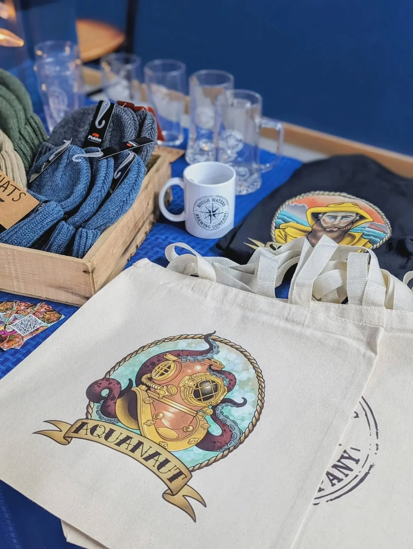 Every label starts with a real Newfoundland artist &mdash; not AI, not stock graphics. Just local art for local beer. Local art thats so good, we put it on a t-shirt!

Get yours here:
https://www.roughwatersbrewing.com/shop